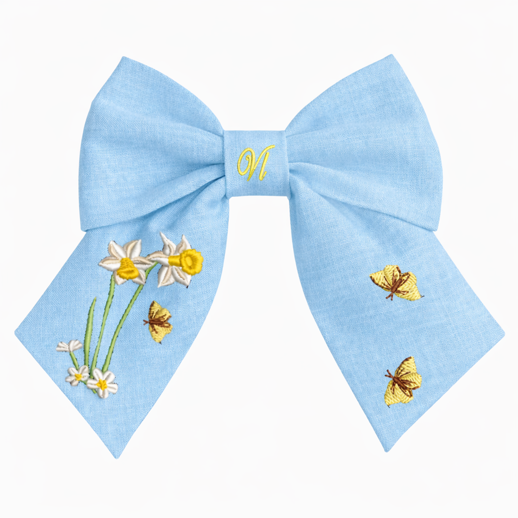 Light blue linen hair bow with floral and butterfly embroidery – handmade
