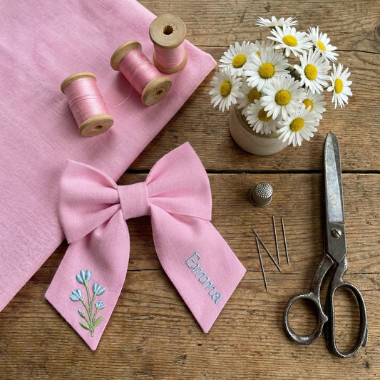 Personalised linen bow with embroidered customer name